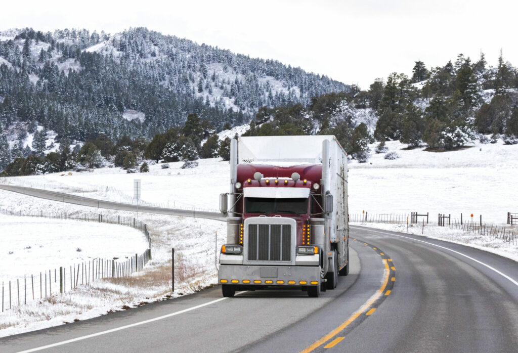 Livestock tractor-trailer in corner